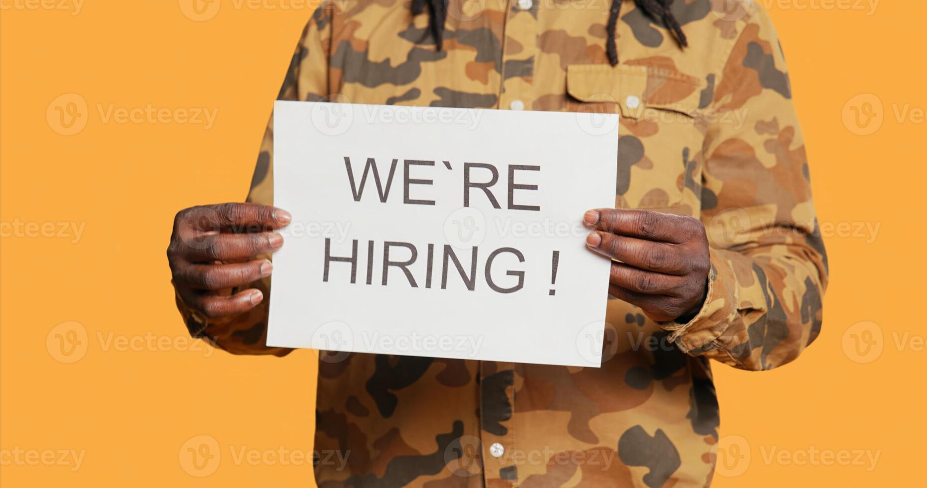 HR manager presents career offers written on files, hiring personnel to fill job vacancy at important corporation. African american job recruiter working on recruiting applicants on candidates. photo