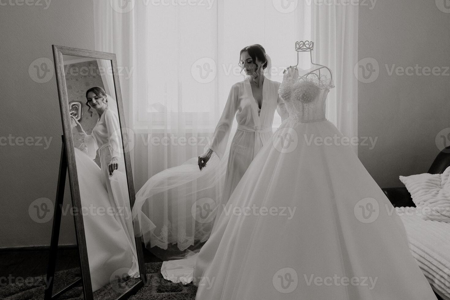A woman is getting ready for her wedding photo