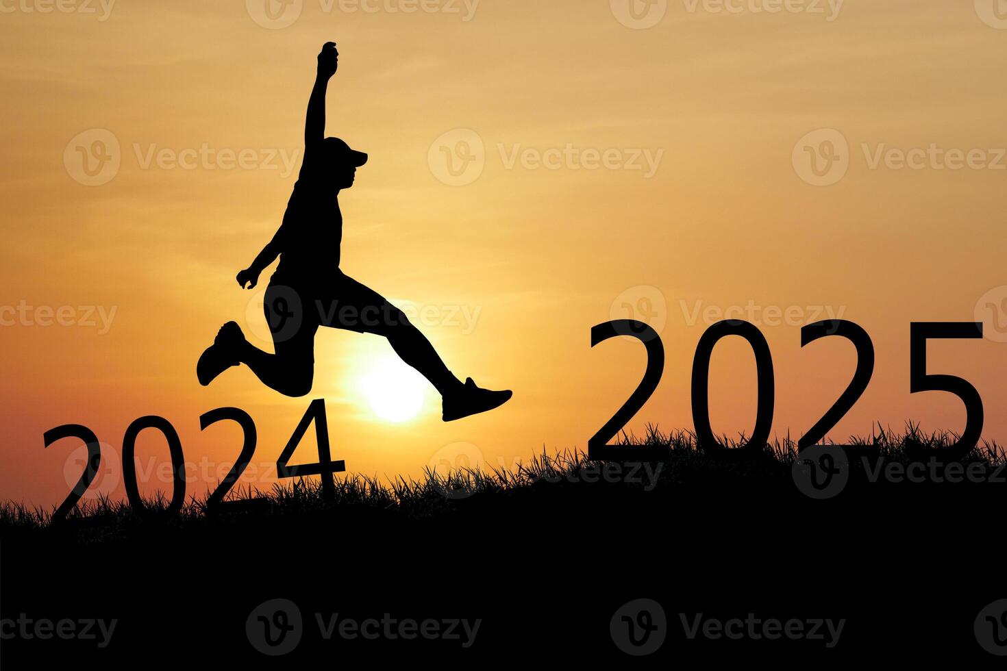 Silhouette of Person Leaping from 2024 to 2025 Against a Vibrant Sunset Sky Symbolizing New Year and Future Goals photo