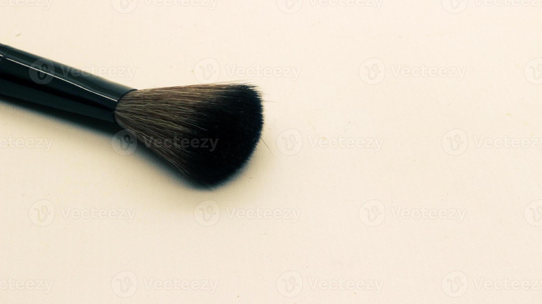 Close up blush brush for makeup isolated photo