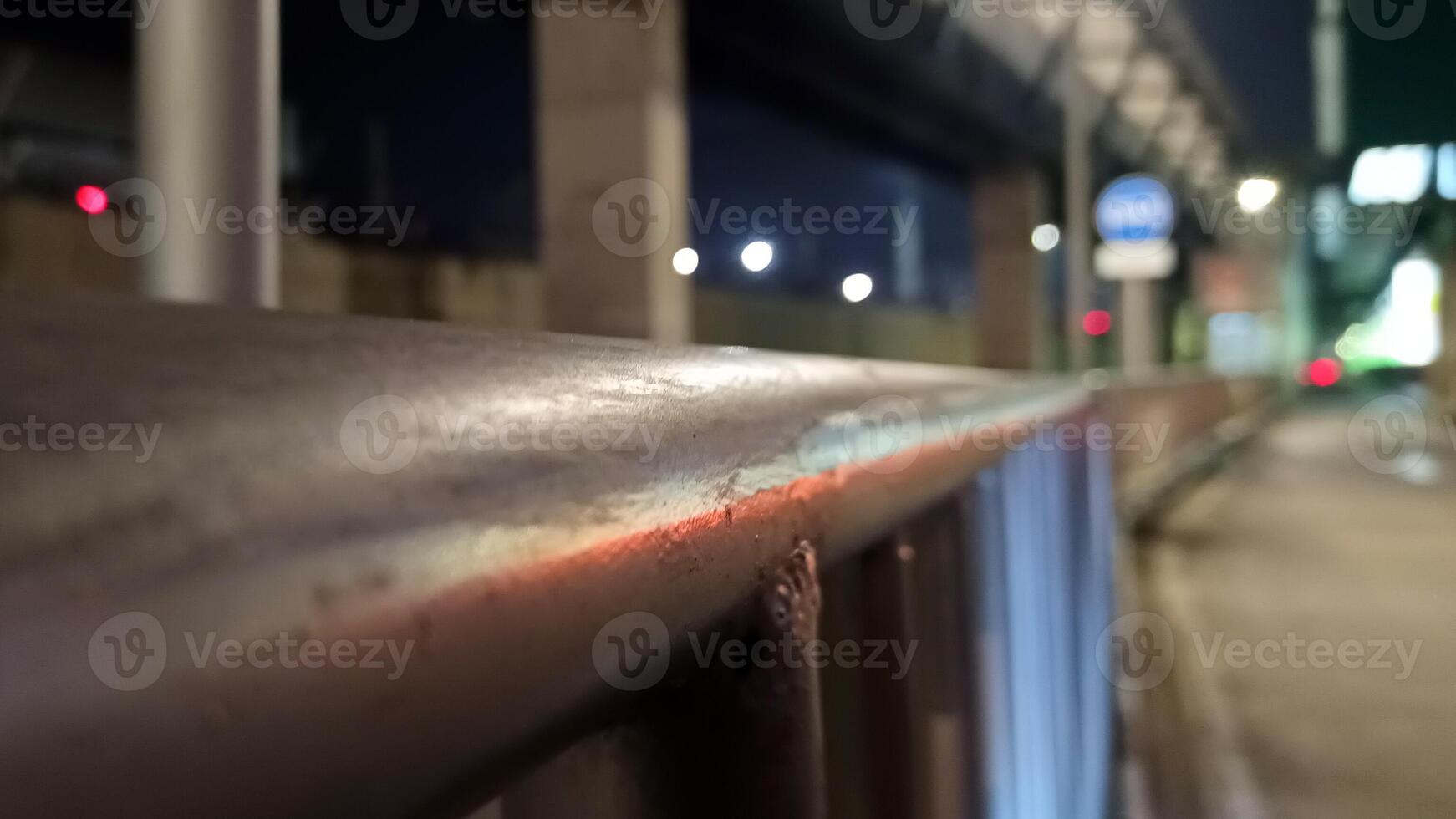 Iron handrail on the side of the road in Jakarta photo