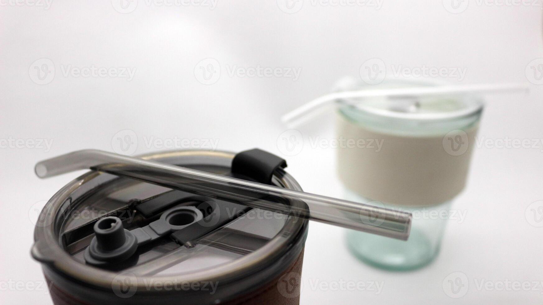 Tumbler in the form of a glass or glass mug with a modern design photo