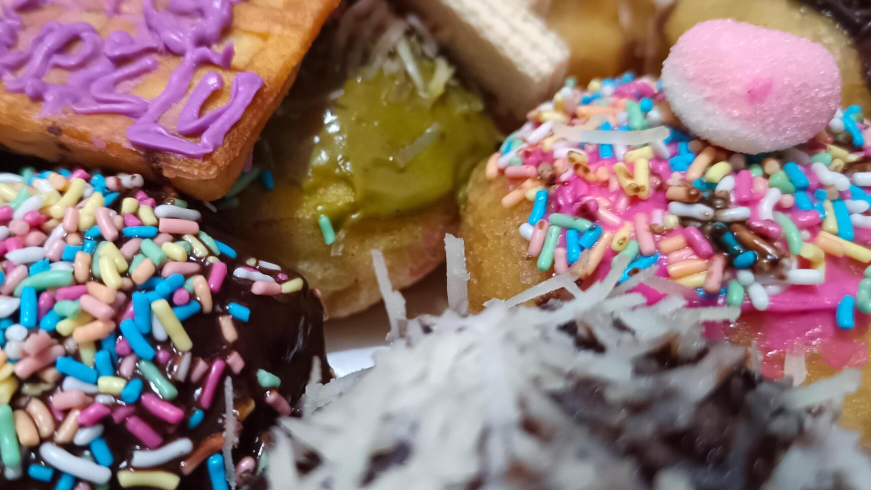 Donut cake with various toppings photo