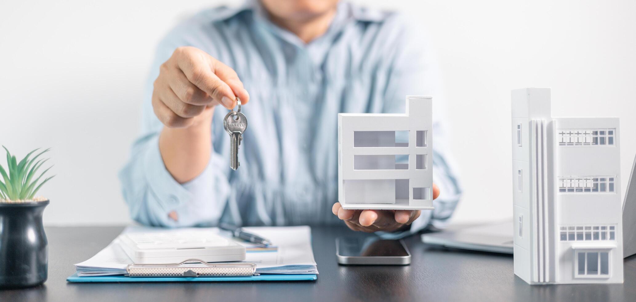 Real estate agent helped the client secure a mortgage loan for their property investment, ensuring the contract was properly handled by the broker. investment, property, estate, loan, real, mortgage. photo