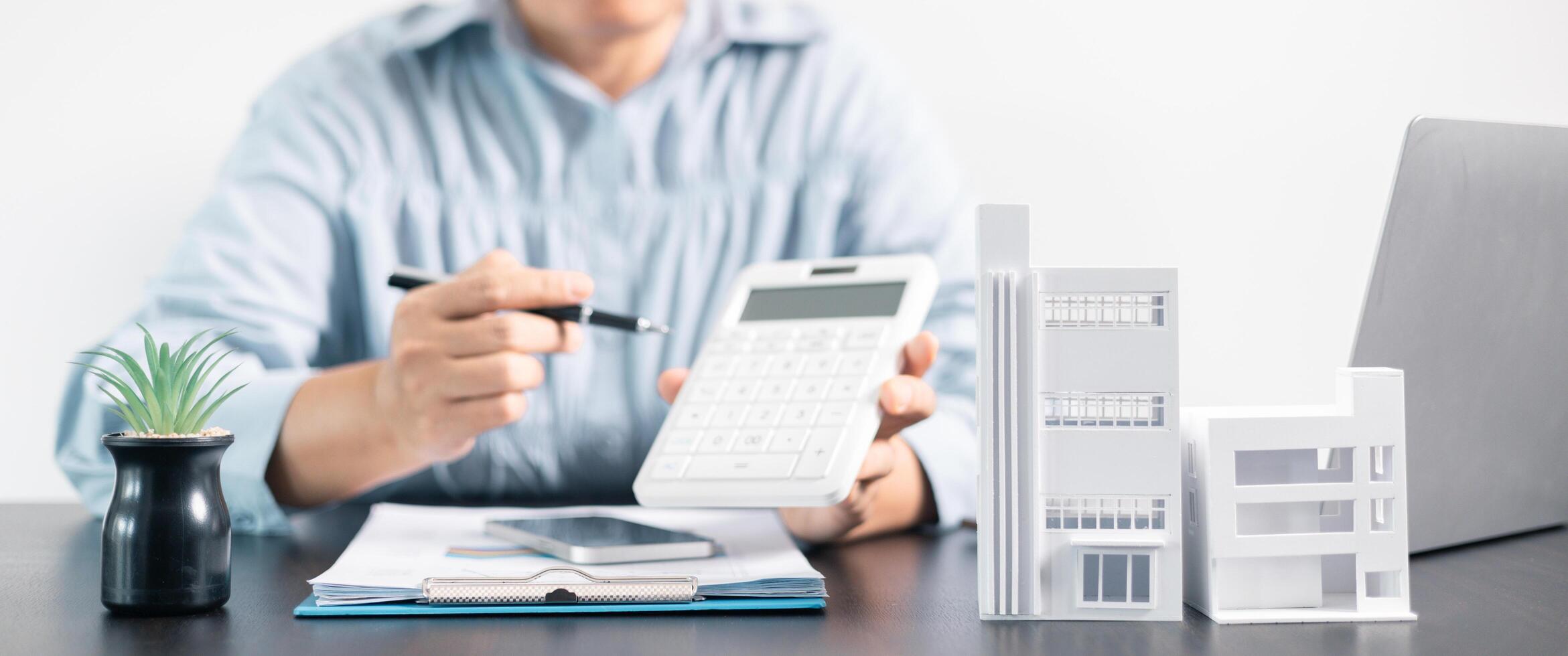 Real estate agent helped the client secure a mortgage loan for their property investment, ensuring the contract was properly handled by the broker. investment, property, estate, loan, real, mortgage. photo
