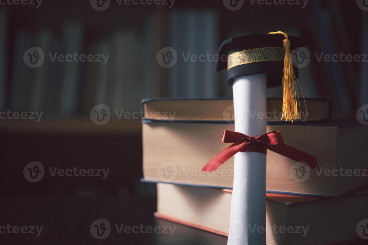 Background of graduation ceremony, people celebrated success of students receiving their higher education certificates, adorned with ribbon, against backdrop of black caps. education, higher. photo