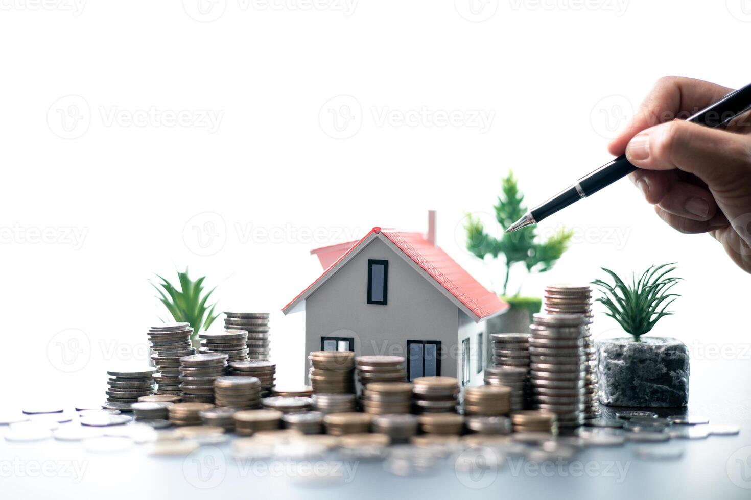 Securing a loan to finance the purchase of a property, the entrepreneur invested in real estate to grow their business using the house as both a home and a valuable asset under a mortgage agreement. photo