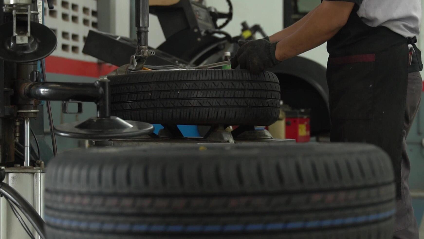 A tire changing machine To change new tires for long-distance transportation photo