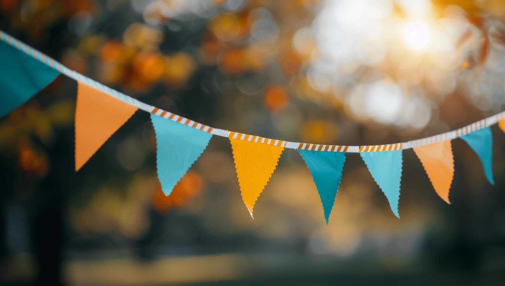 Colorful Bunting Flags Against Blurred Background photo
