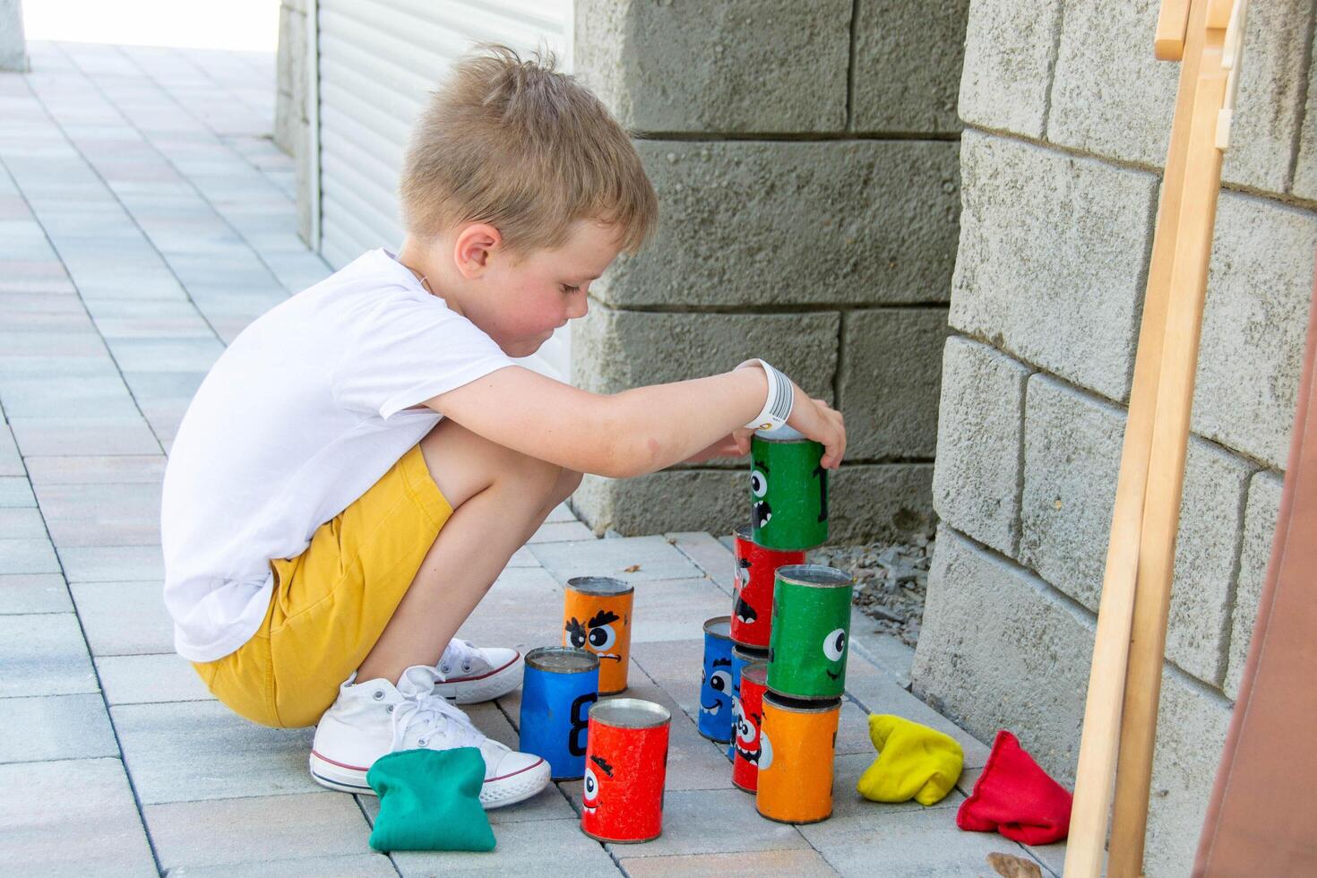 Little children run around and play in the playground. photo