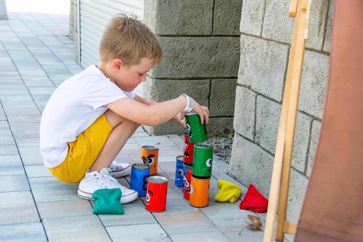 Little children run around and play in the playground. photo