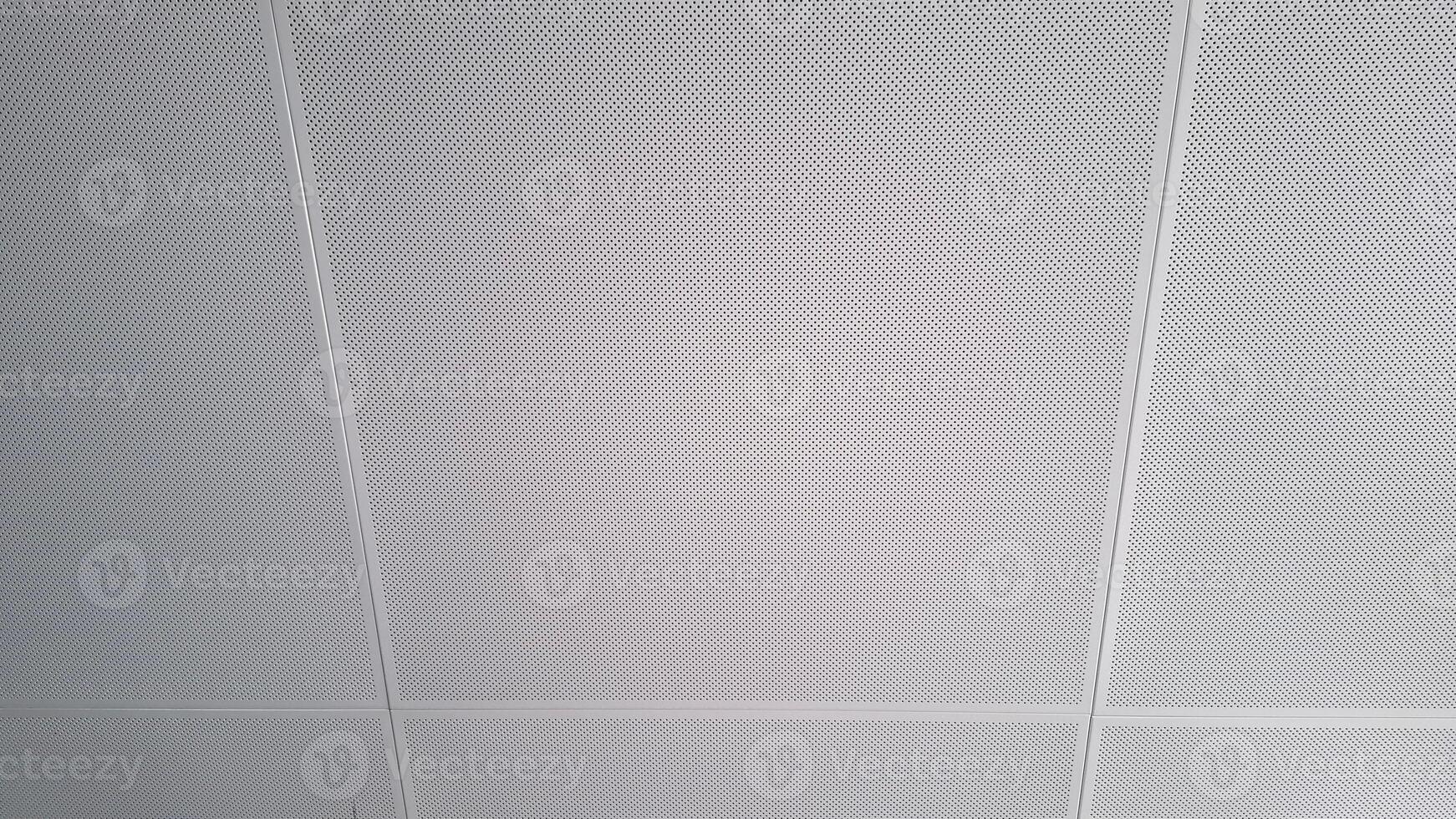 A close up view of a white textured ceiling photo