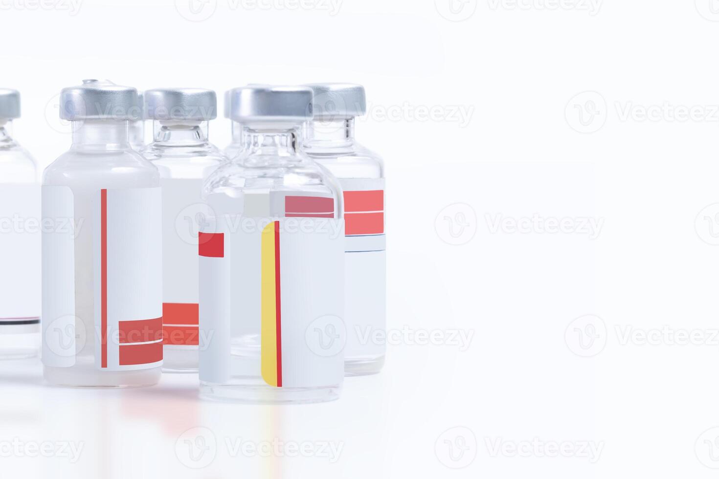 Medical vaccine vials on white background with copy space. photo