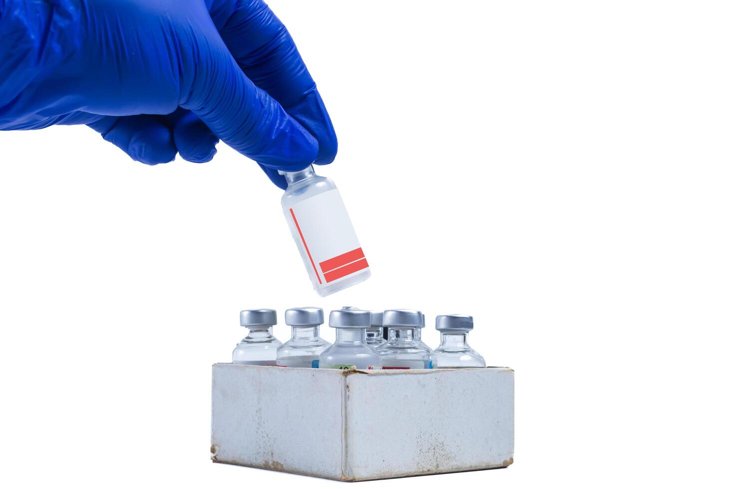 Blue glove holding a vial for collecting blood samples isolated on white background. closeup photo
