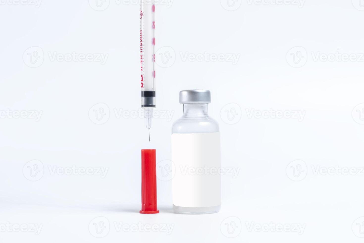 Vaccine bottle and syringe isolated on white background with copy space. photo