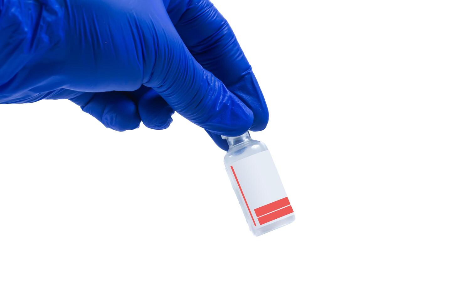 Hand in blue gloves holding a vial of vaccine isolated on white background photo