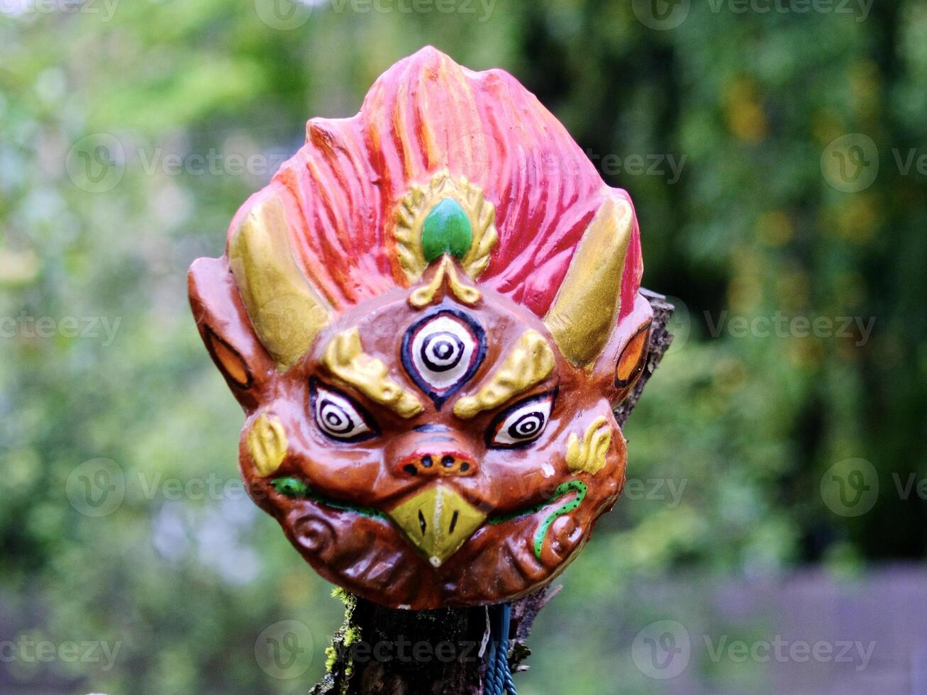 The Mongolian Garuda mask in the form of the head of a mythical bird photo