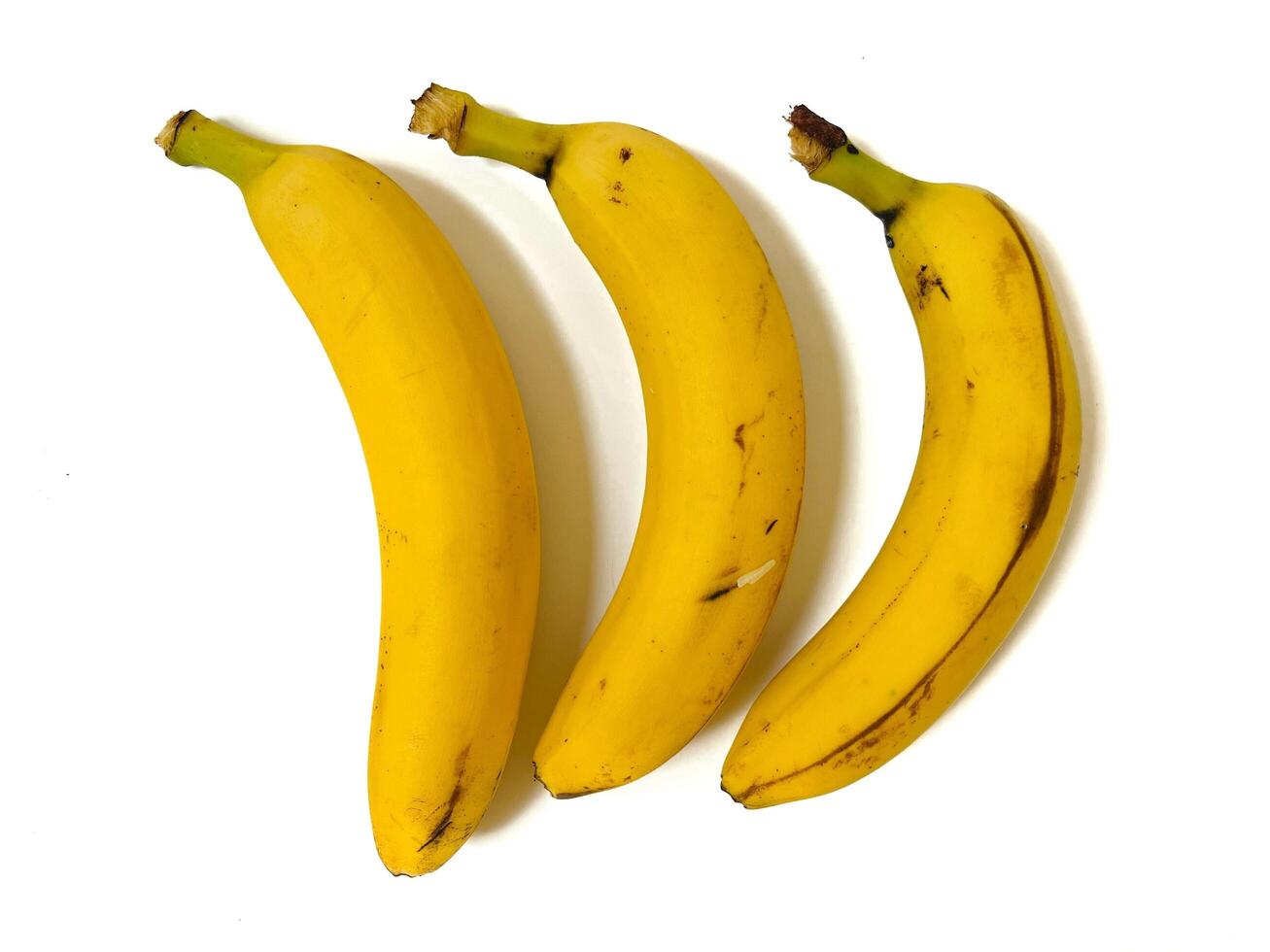 Ripe bananas isolated on white background with clipping path and full depth of field photo