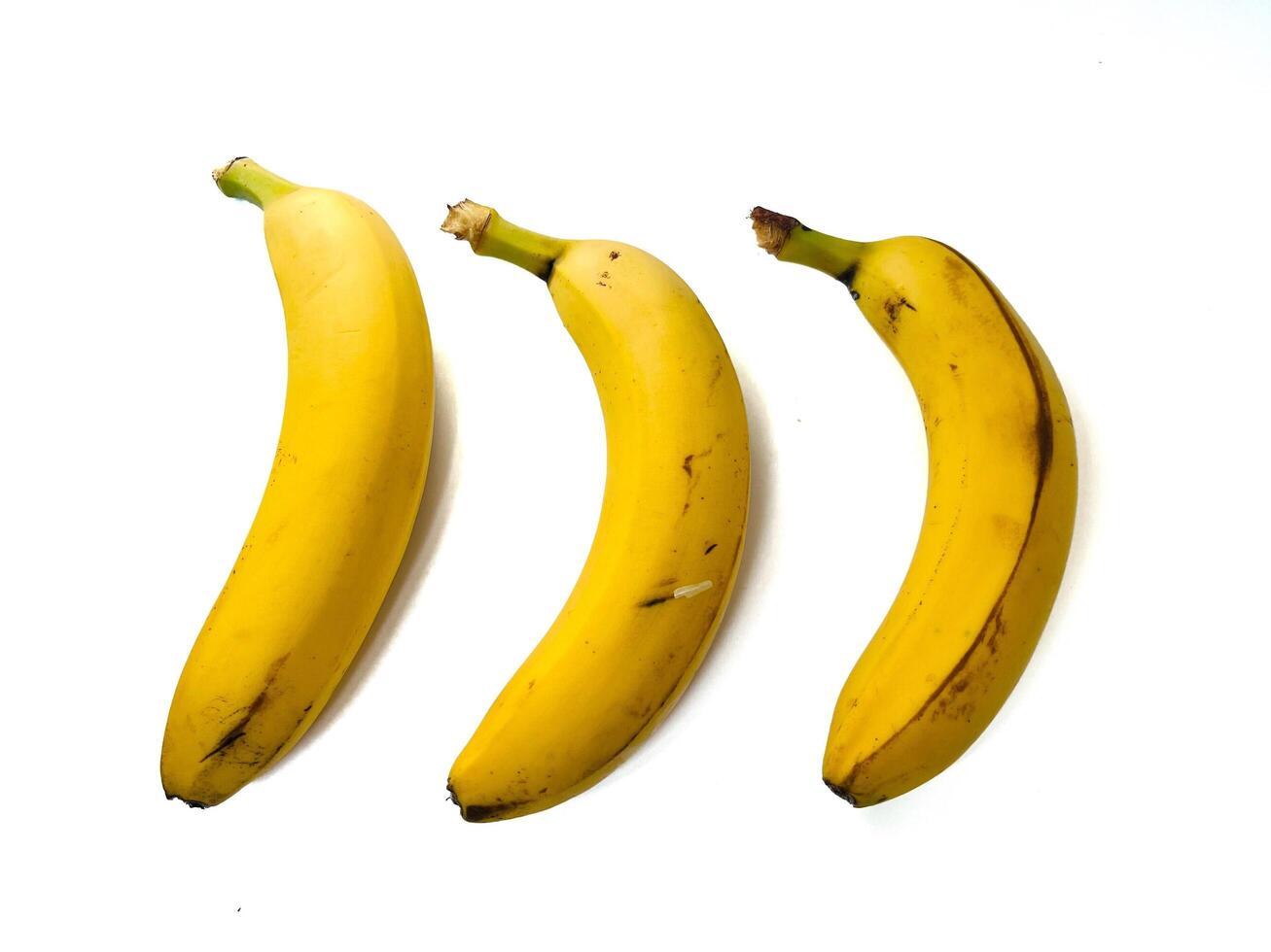 Ripe bananas isolated on white background with clipping path and full depth of field photo