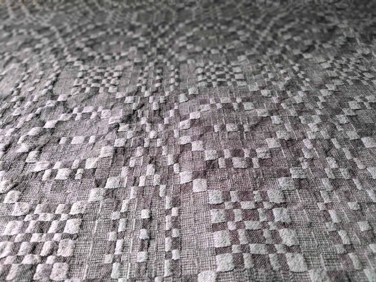 Handmade homespun fabric in an old rustic ethnic style. Traditional warm handmade texture effect. photo