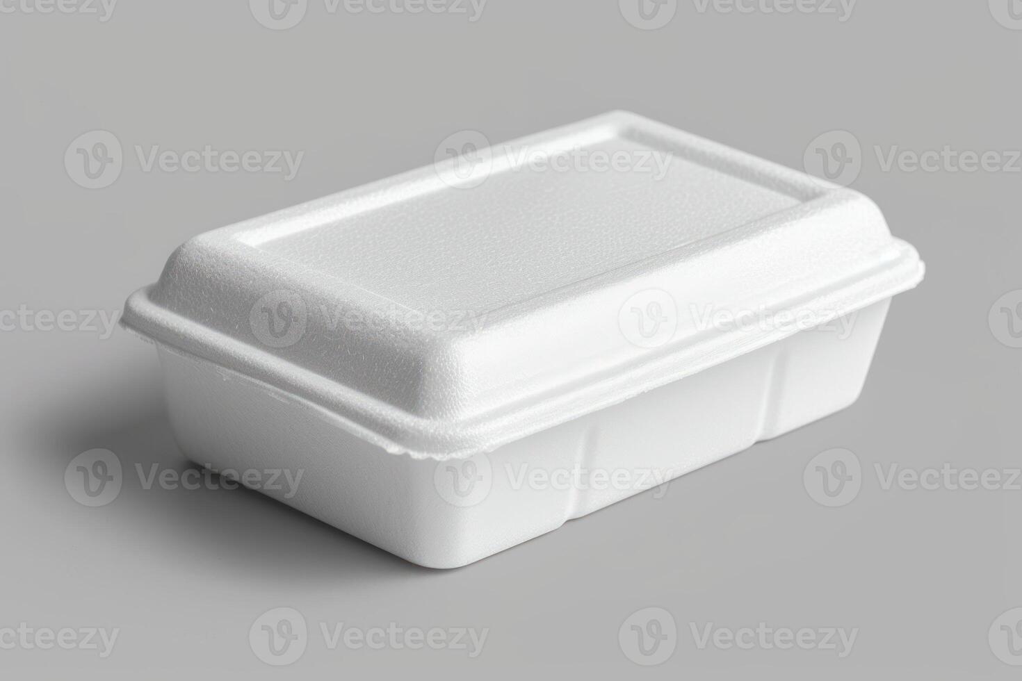 a closed container on top of some gray surface, photo