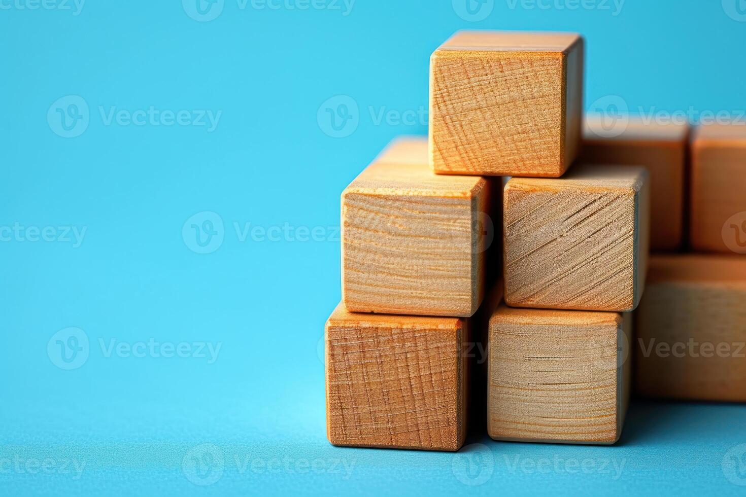 a stack of wooden toys, including blocks, photo