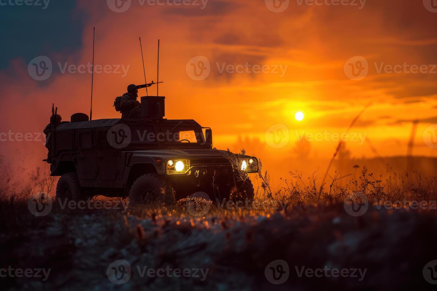 an armored vehicle in the middle of a field at sunset, photo
