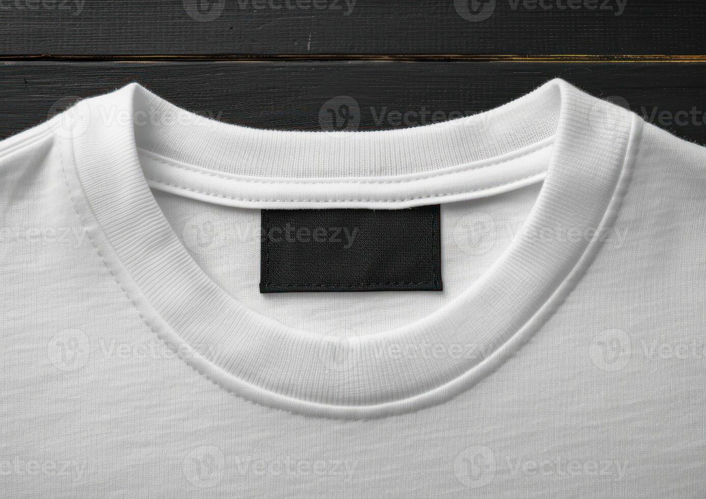 an empty shirt with a black label taped on the back, photo