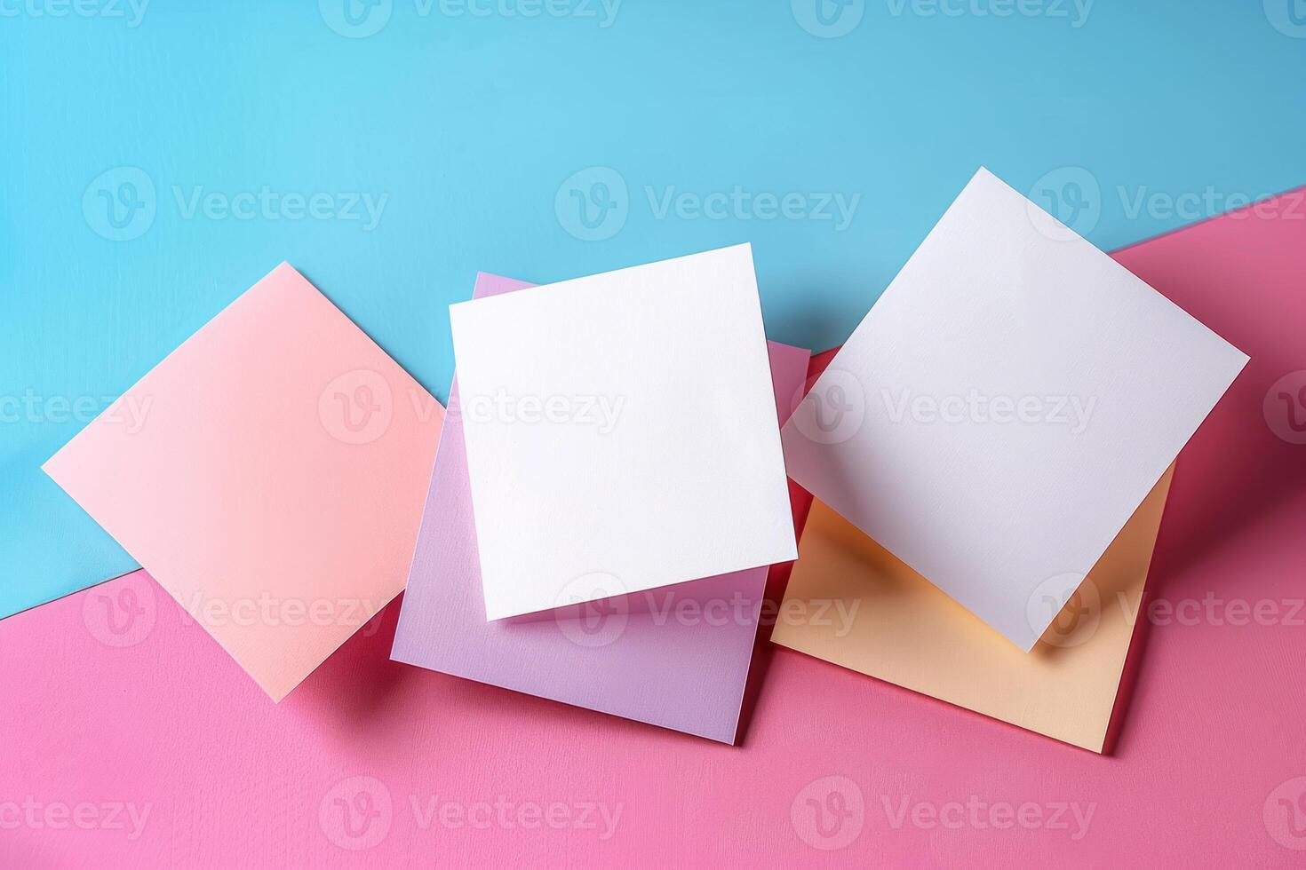 three square, paper boxes and a single sheet of colored paper, photo