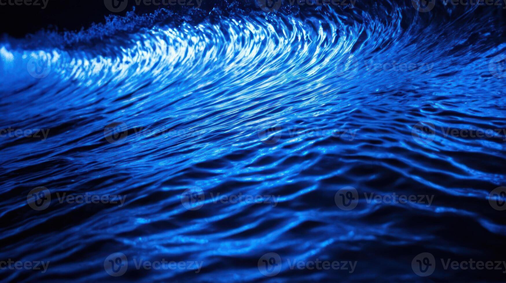 the blue waves are sparkling in front of this dark sky, photo