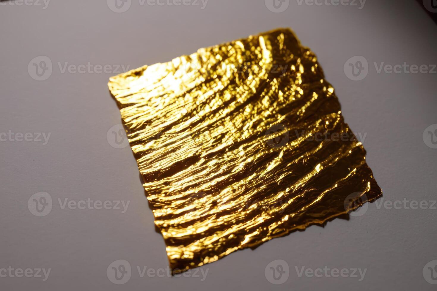 two pieces of foil next to each other, photo