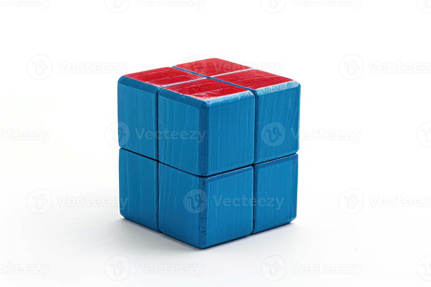 three cubes in a shape with red rubiets, photo