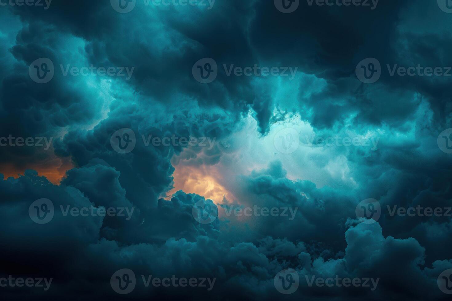 some dark clouds with orange light on them, photo