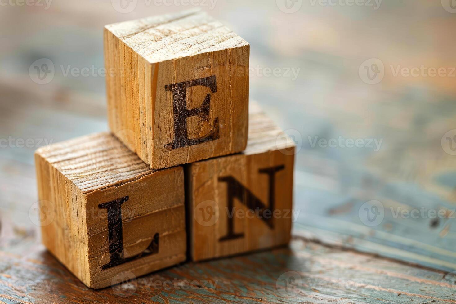 wood letters stacked on top of bricks spelling the word'lin ', photo