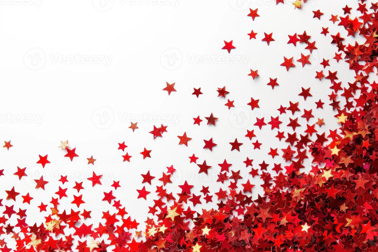 shiny red and gold stars are scattered on a white surface, photo