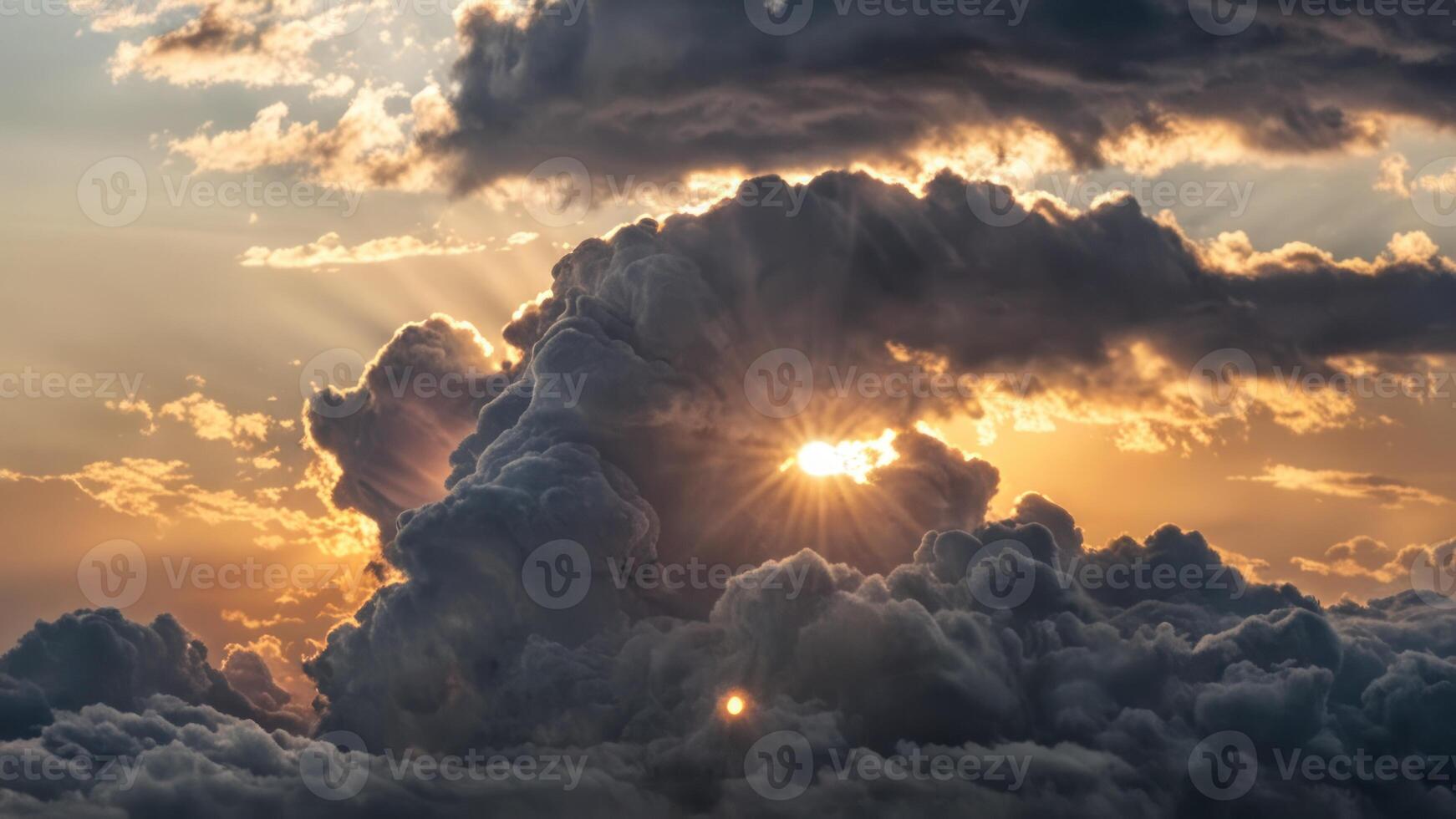 sun coming out from behind clouds in an otherwise cloudy sky, photo