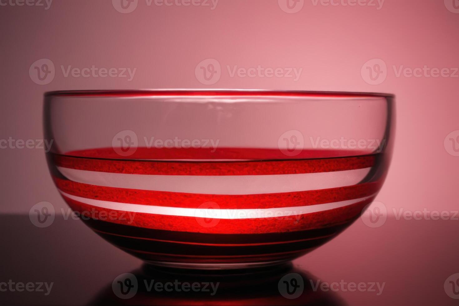 a clear cup filled with red liquid, photo