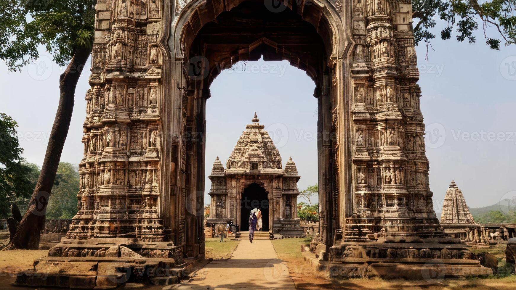 a large archway with an elaborate structure in it and people standing on the other side of it, photo