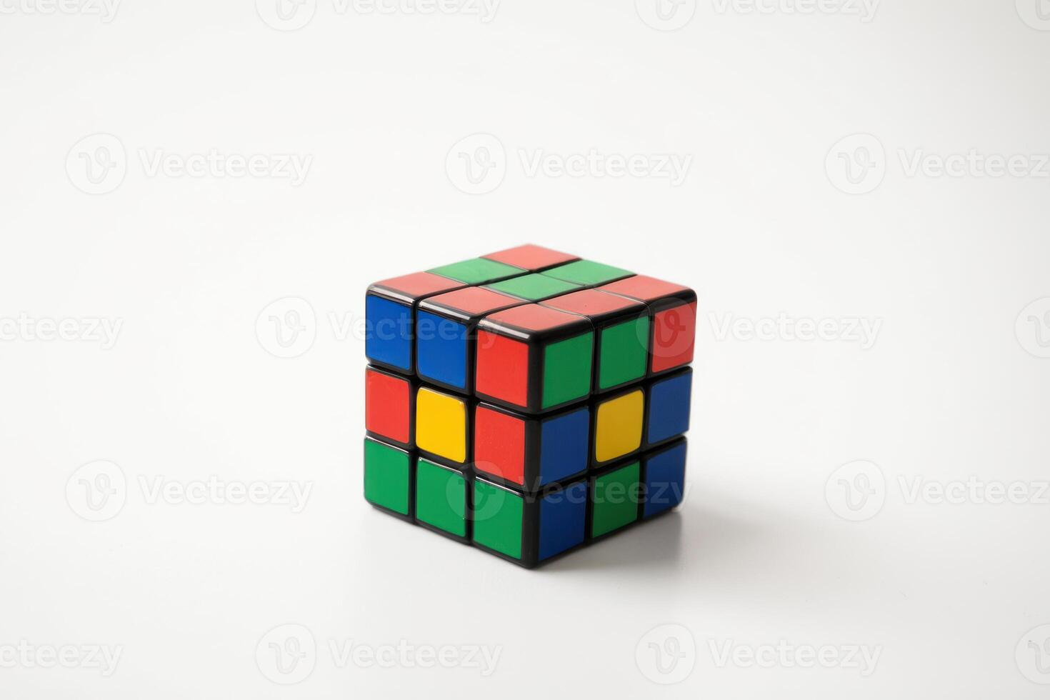 four colored cubes set on tables with two missing sides, photo