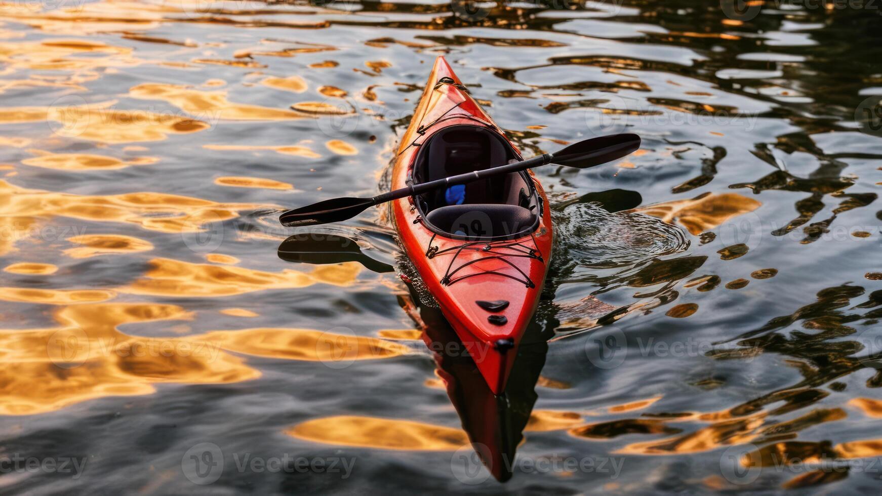 there is a red kayak that floats on the water, photo