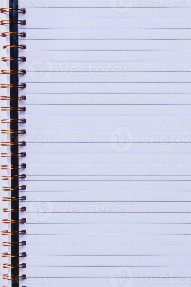 a picture of the back side of a spiral notebook, photo