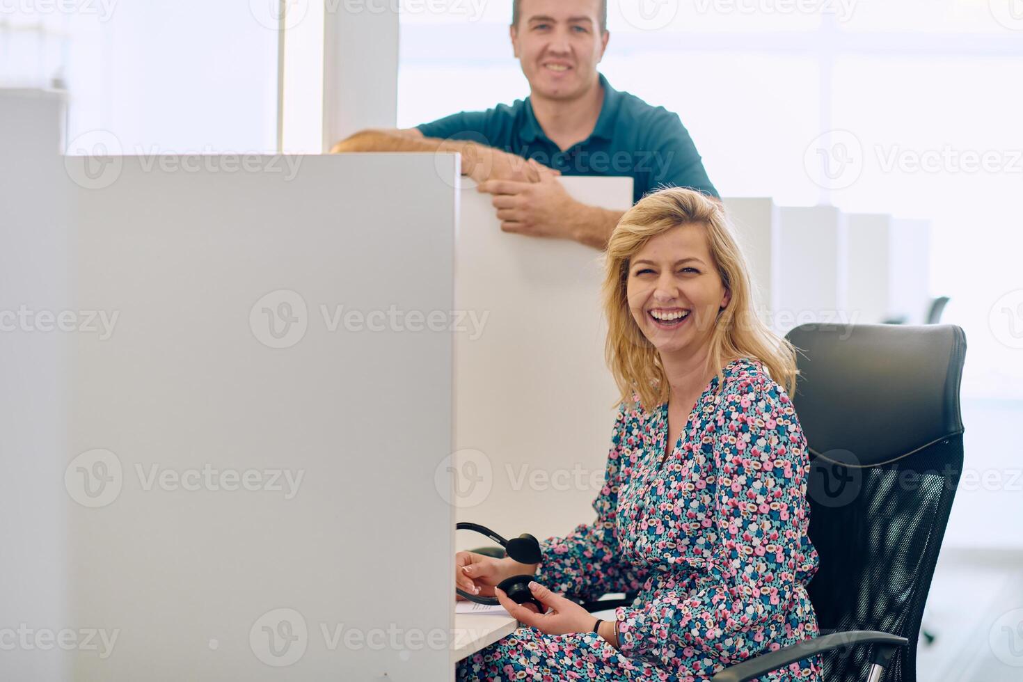 Colleagues in the call center take a moment to connect during their break. photo