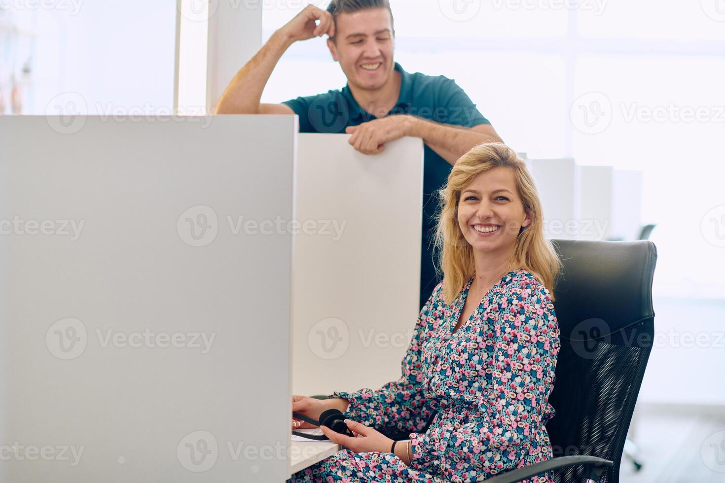 Colleagues in the call center take a moment to connect during their break. photo