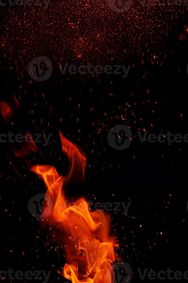 High-Resolution Fiery Flame and Sparks on Black Background, Ideal Texture Element for Barbecue and Culinary Themes photo