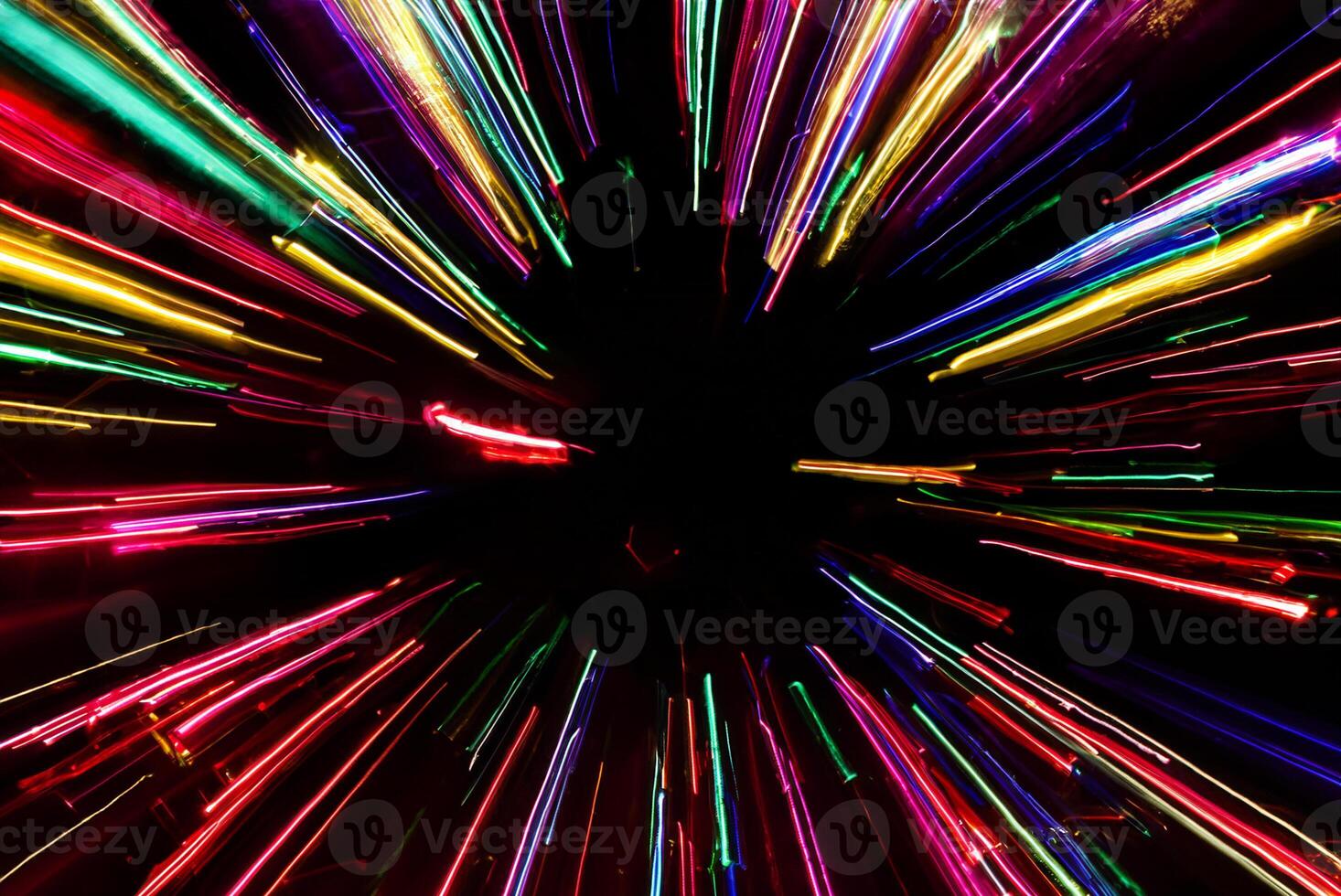 Vibrant Neon Light Traces Against Dark Background photo