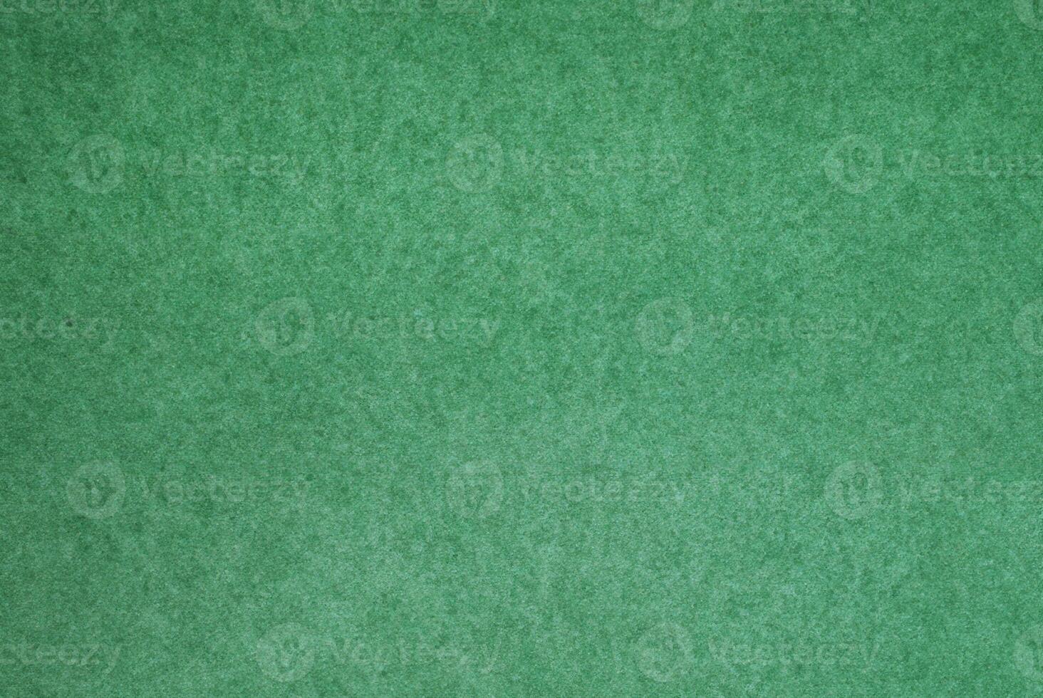 Green Colored Paper Background Texture photo