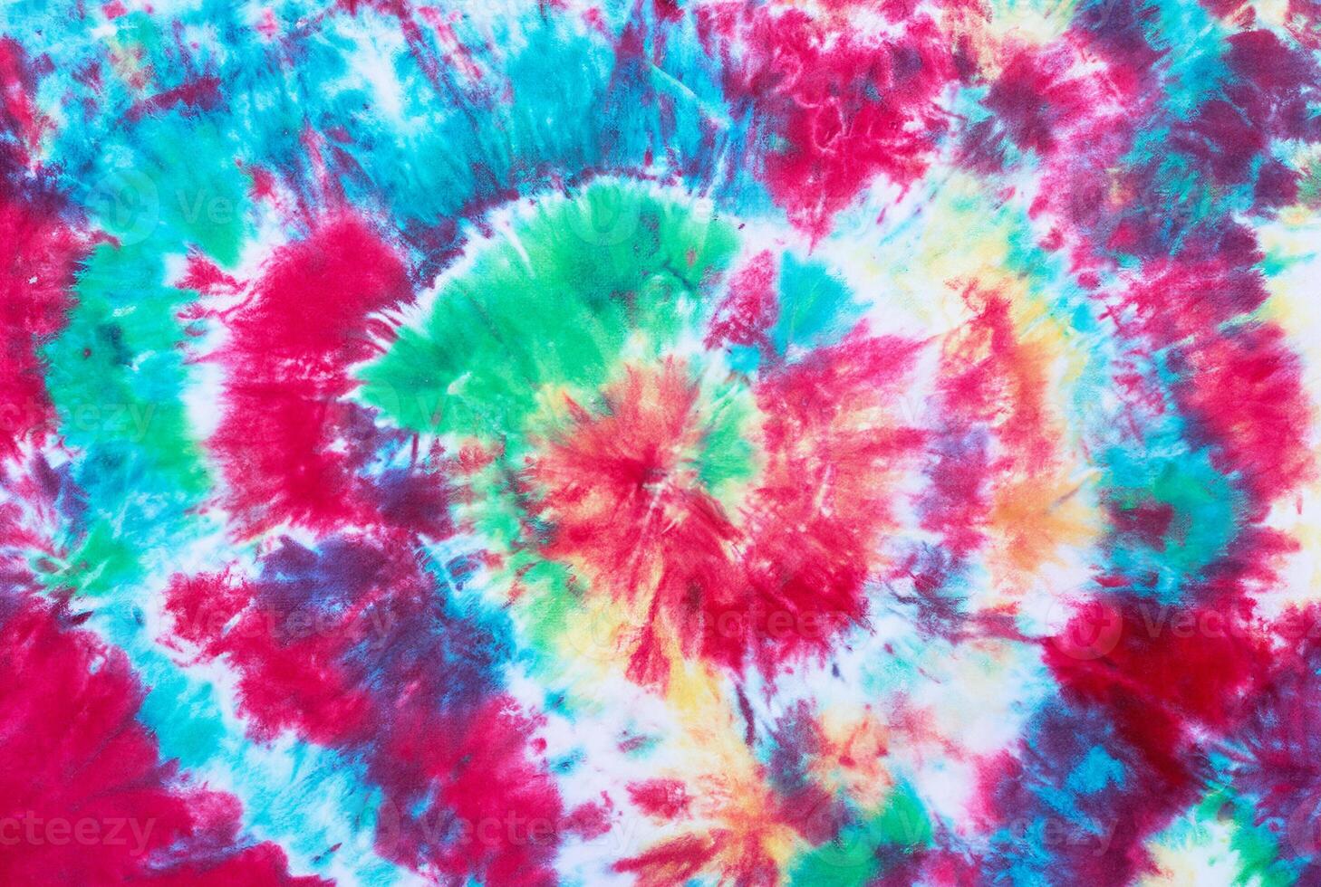 Abstract Hand-Dyed Tie-Dye Pattern on Cotton Fabric photo