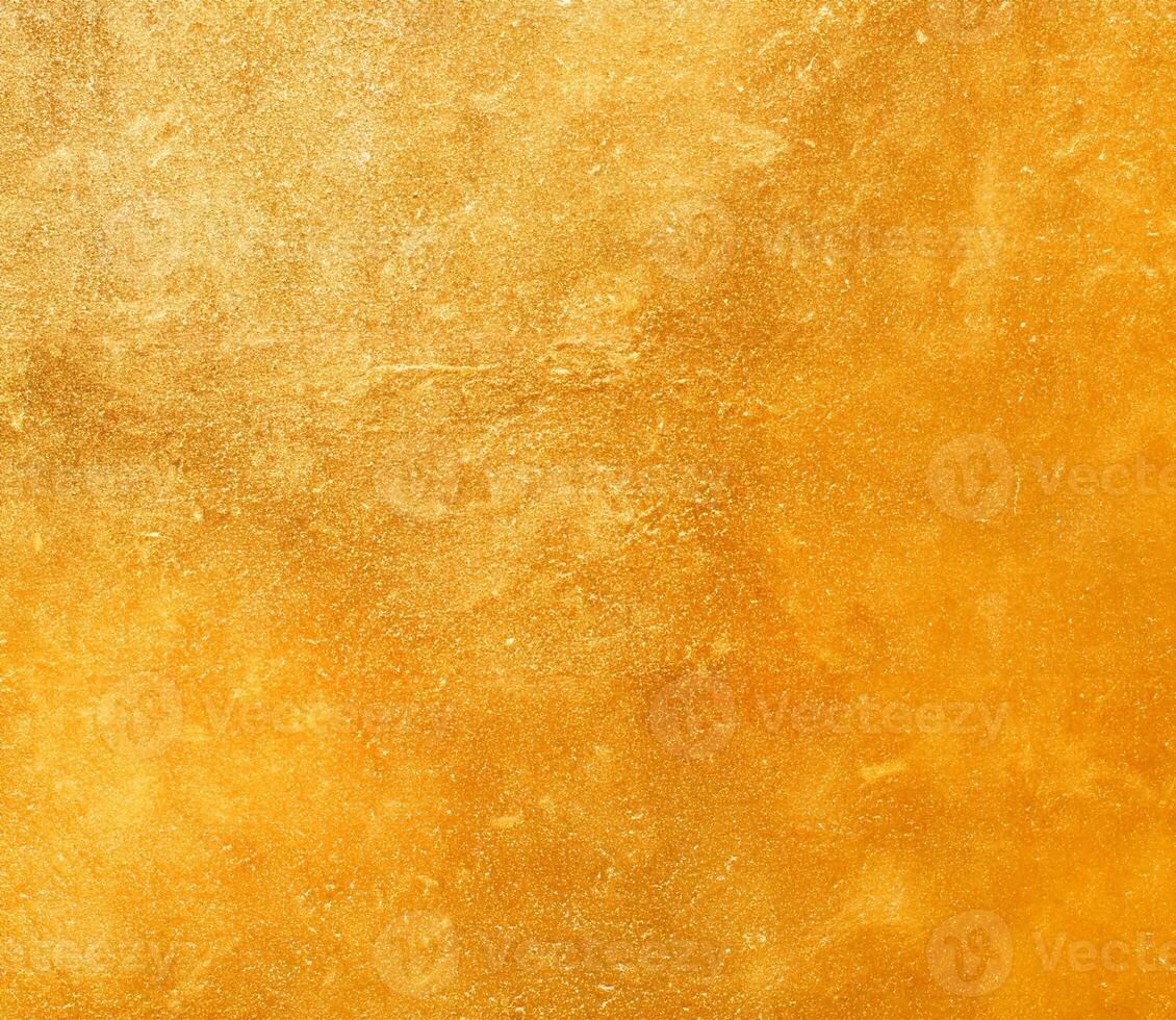 Shiny Yellow Gold Foil Leaf Texture Background photo