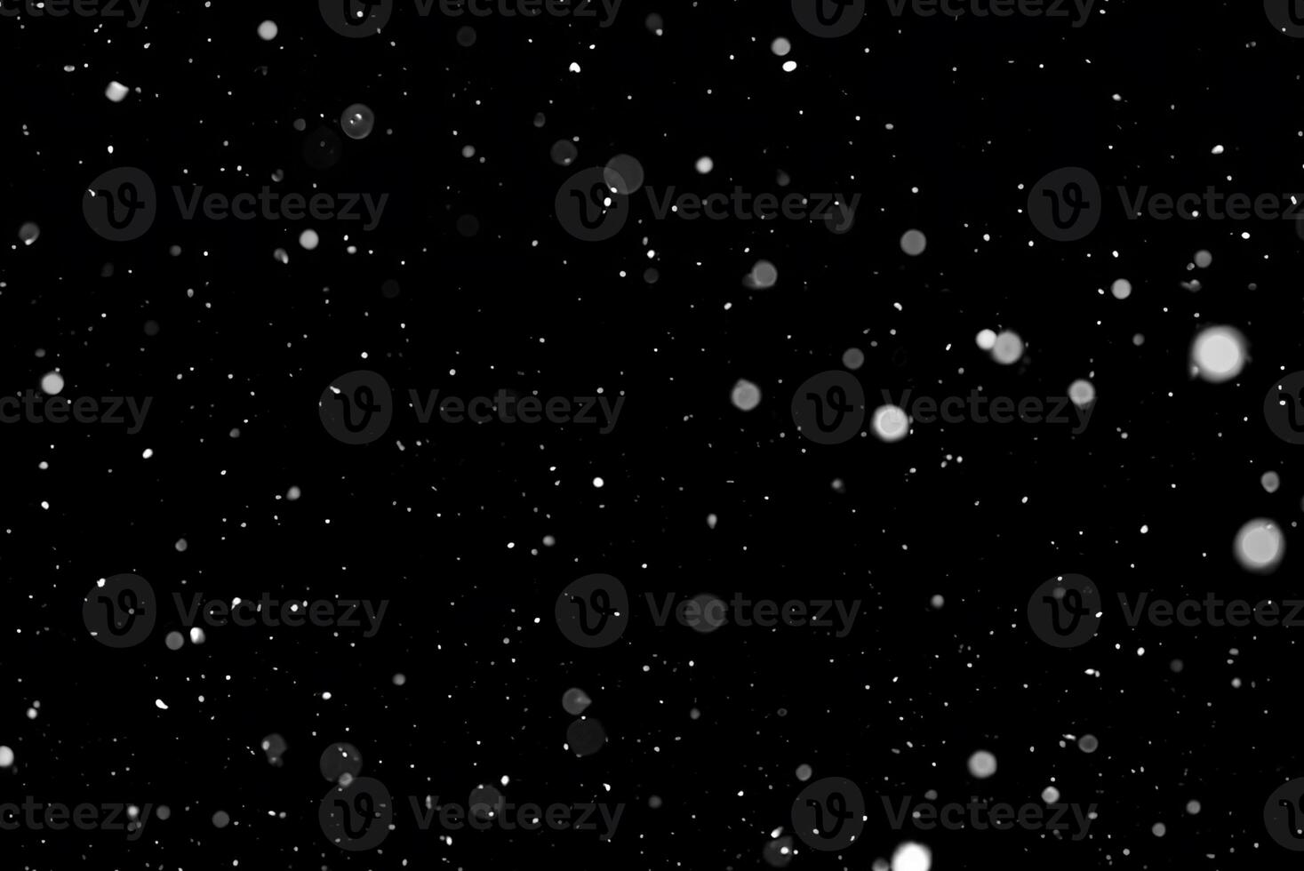 White Snow Bokeh on Black Background - Snowfall Design Element photo