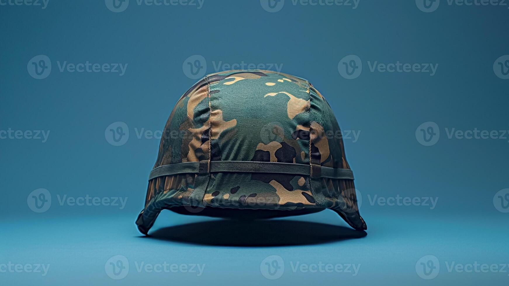 Camouflage Helmet on Blue Background. Military Gear, Soldier Protection, Wartime Symbol. photo